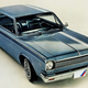 A photo of a pale blue Rambler American coupe.
